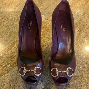Gucci women’s peep toe pumps